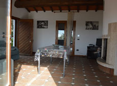 Wohnzimmer mit Kamin, Ferienhaus Casa Gaia-Trilocale, Capoliverie, Insel Elba